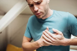 Man having a heavy chest feeling